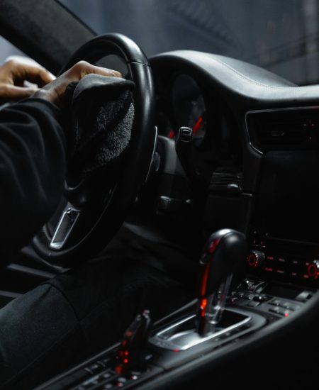 Photo by Tima Miroshnichenko: https://www.pexels.com/photo/person-in-black-long-sleeves-sitting-on-the-driver-s-seat-while-wiping-the-stirring-wheel-6872585/